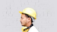 Man with safety helmet, yellow PPE