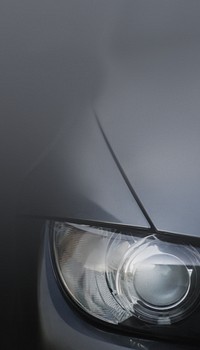 Car's headlight closeup phone wallpaper