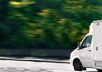 White delivery truck background, countryside drive