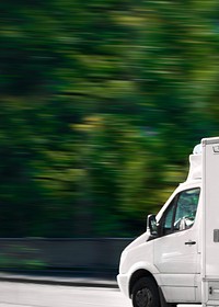 White delivery truck background, countryside drive