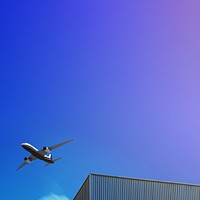 Flying plane, gradient background