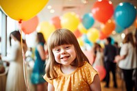 Down syndrome girl at birthday party