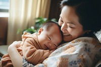 Baby sleeping on mom's chest