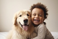 Toddler hugging Golden Retriever 