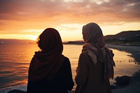 Muslim women at a beach