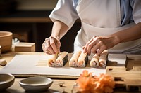 Asian chef making Japanese food