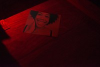 Photo of a woman in red room