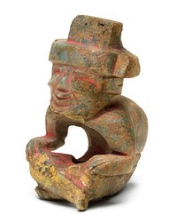 Seated Figurine of an Old God