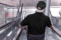 Security guard on escalator