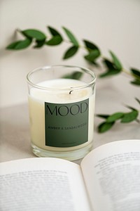 Scented candle label mockup, opened book, home spa psd