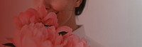 Woman smelling flower background, pink design