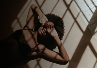 Woman background, laying on the ground, window shadow image