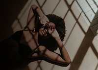 Woman background, laying on the ground, window shadow image