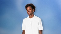 Smiling black teenage boy in white polo shirt