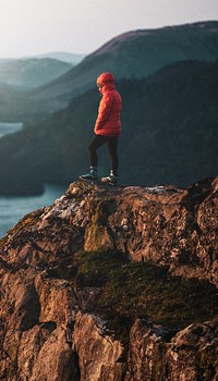 Man standing cliff iPhone wallpaper, nature travel image