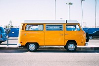 Yellow van at the parking lot. Original public domain image from Wikimedia Commons