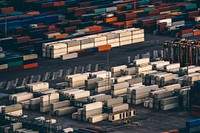 Stacks of shipping containers in the Port of Barcelona. Original public domain image from Wikimedia Commons