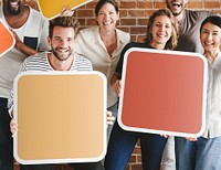 Diverse people holding blank signs