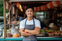 Cheerful standing smiling chef. 