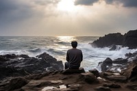 Sitting rock landscape outdoors. AI generated Image by rawpixel.