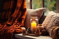 Candle windowsill pillow autumn. AI generated Image by rawpixel.