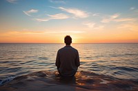 Sitting sea standing outdoors. AI generated Image by rawpixel.