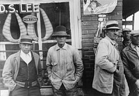 Men in front of general store, Mound Bayou, Mississippi by Russell Lee