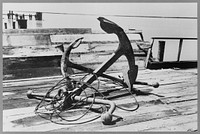 Anchors on dock, Burrwood, Louisiana by Russell Lee