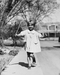 Girl jumping rope. Sourced from the Library of Congress.