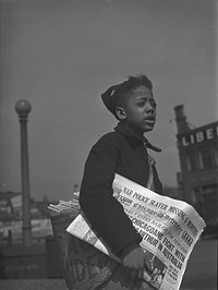 Chicago, Illinois. Newsboy selling the Chicago Defender, a leading  newspaper. Sourced from the Library of Congress.