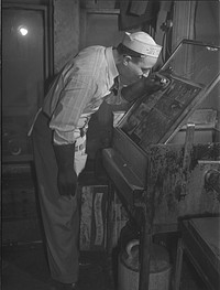Chicago, Illinois. Engraver on the Chicago Defender, a  newspaper. Sourced from the Library of Congress.