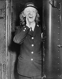 On many Pennsylvania trains in the Philadelphia area, trainmen are relieved for service in the armed forces and replaced by women. Sourced from the Library of Congress.