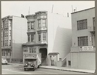 San Francisco, Calif. Apr. 1942. The moving van backing up to the curb to load possessions of evacuated residents of Japanese ancestry, who will be housed in War Relocation Authority centers for the duration of the war. Sourced from the Library of Congress.