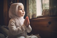 Toddler contemplation spirituality architecture. AI generated Image by rawpixel.
