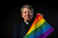 Flag portrait holding rainbow. 