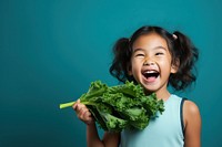 Laughing eating child happy. 