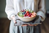 Bowl holding fruit berry. AI generated Image by rawpixel.