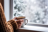 Coffee cup by the window. 