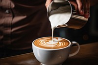 Coffee cup barista pouring. 