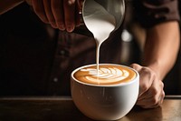 Coffee cup barista pouring. .