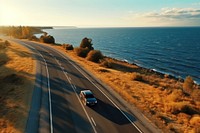 Car vehicle road sea. 