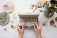 Jewelry box table hand. AI generated Image by rawpixel.
