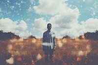 Man standing in meadow. AI generated Image by rawpixel.