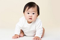 Baby crawling portrait photo. 