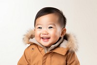 Portrait toddler smiling jacket. 