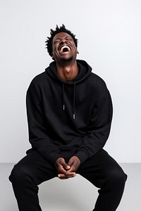 Laughing adult black man. 