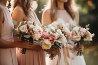 Bridesmaid outdoors wedding holding. 