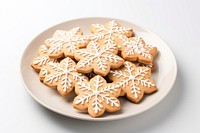 Cookie plate gingerbread snowflake. AI generated Image by rawpixel.