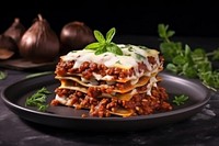 Plate lasagna food mozzarella. 