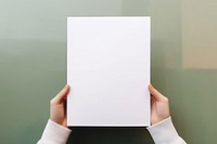 Holding paper white text. AI generated Image by rawpixel.